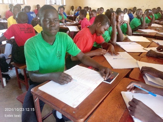 The photo above show beneficiary in the classroom learning with fellow at Don Bosco Secondary school
